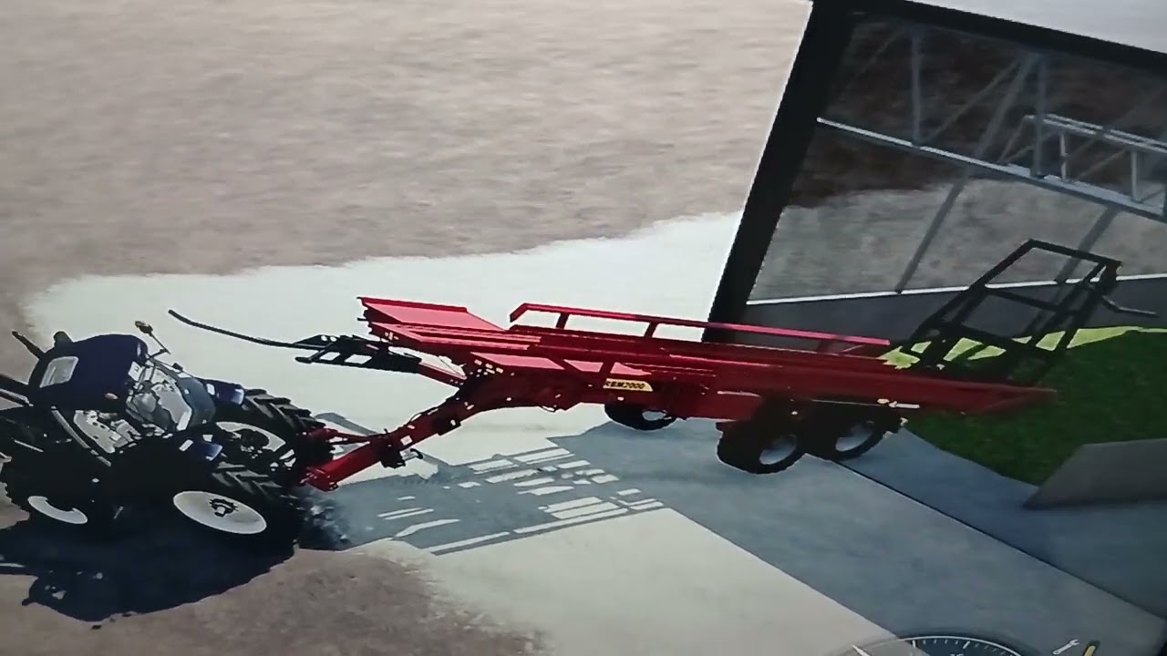 Je mai  les ballot de foin  avec le  chariot  derrière  le  hangar christophe aube patron 