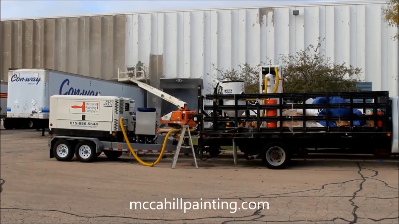 Vapor Blasting a Precast Concrete Building - McCahill Painting Company