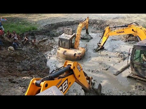 hyundai-excavator-are-badly-trapped-in-the-pond-|-rescued-by-jcb-loader-and-excavator.-[part---1]