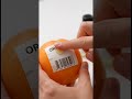 Remove stubborn fruit stickers cleanly using a dab of oil #Shorts