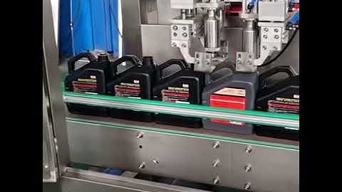 Automatic two nozzles tracking filling machine for lubricant oil