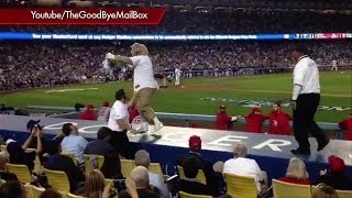 Midway through the cardinals-dodgers game last night dodgers bear
mascot got up on first base dugout and started pumping crowd! watch
full seg...
