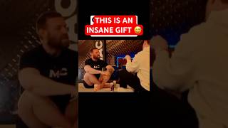 Conor McGregor gets gifted the glove worn during the raid on Osama bin Laden 😅