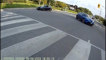 Close call....near head on collision with a vehicle making left turn at an intersection.