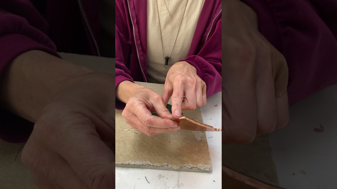 Foiling a stained glass piece with the copper foil technique