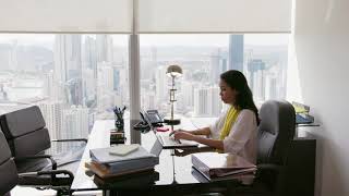 Business Woman Secretary Typing Fast On Laptop In Office