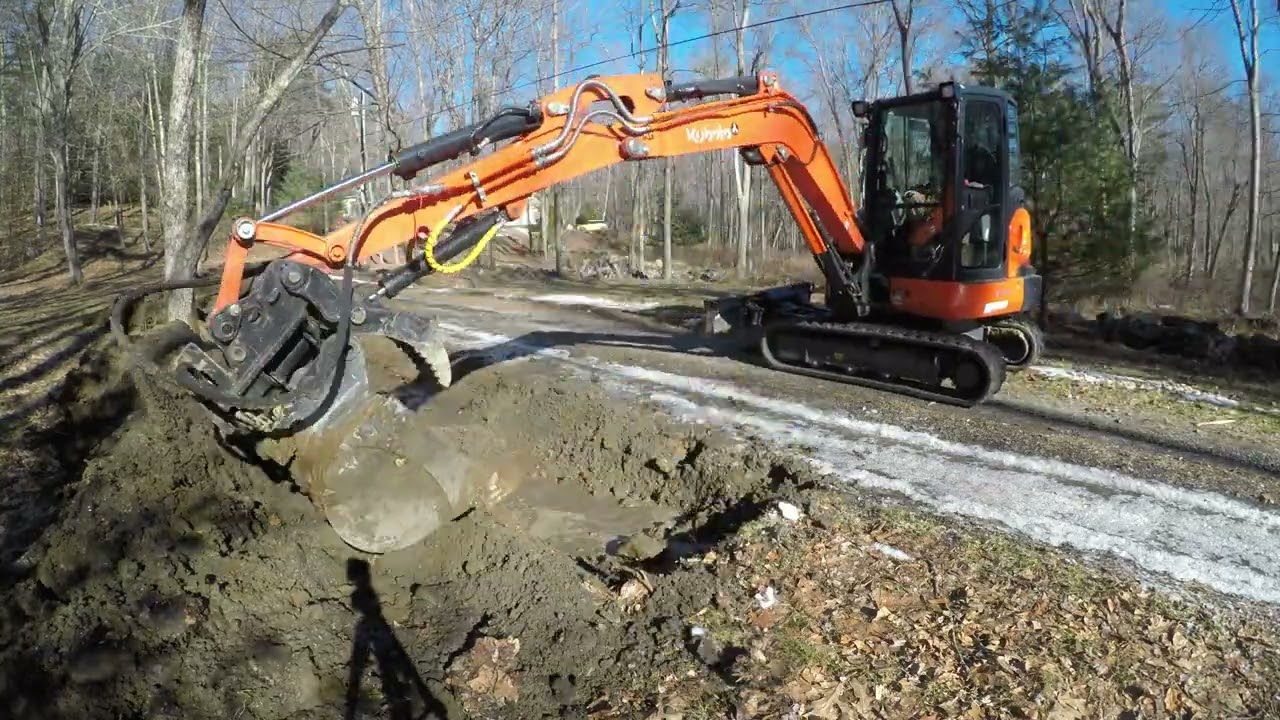Icy road pond to functional driveway!