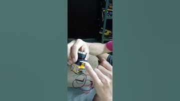 910. PUSH BUTTON SWITCH Device/shown how to press the  LOCK to disengage the Button