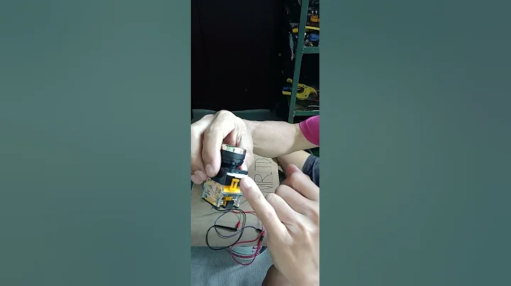 910. PUSH BUTTON SWITCH Device/shown how to press the  LOCK to disengage the Button