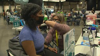 First shots given at mass COVID-19 vaccine site at Seattle’s Lumen Field Event Center