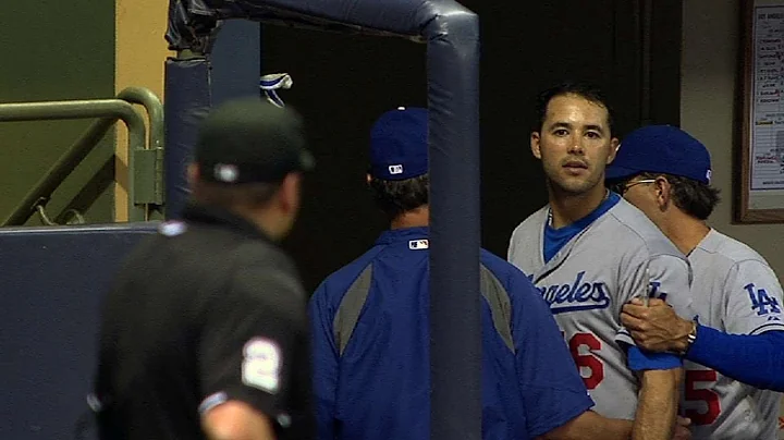 LAD@MIL: Ethier tossed after pitch sails over head