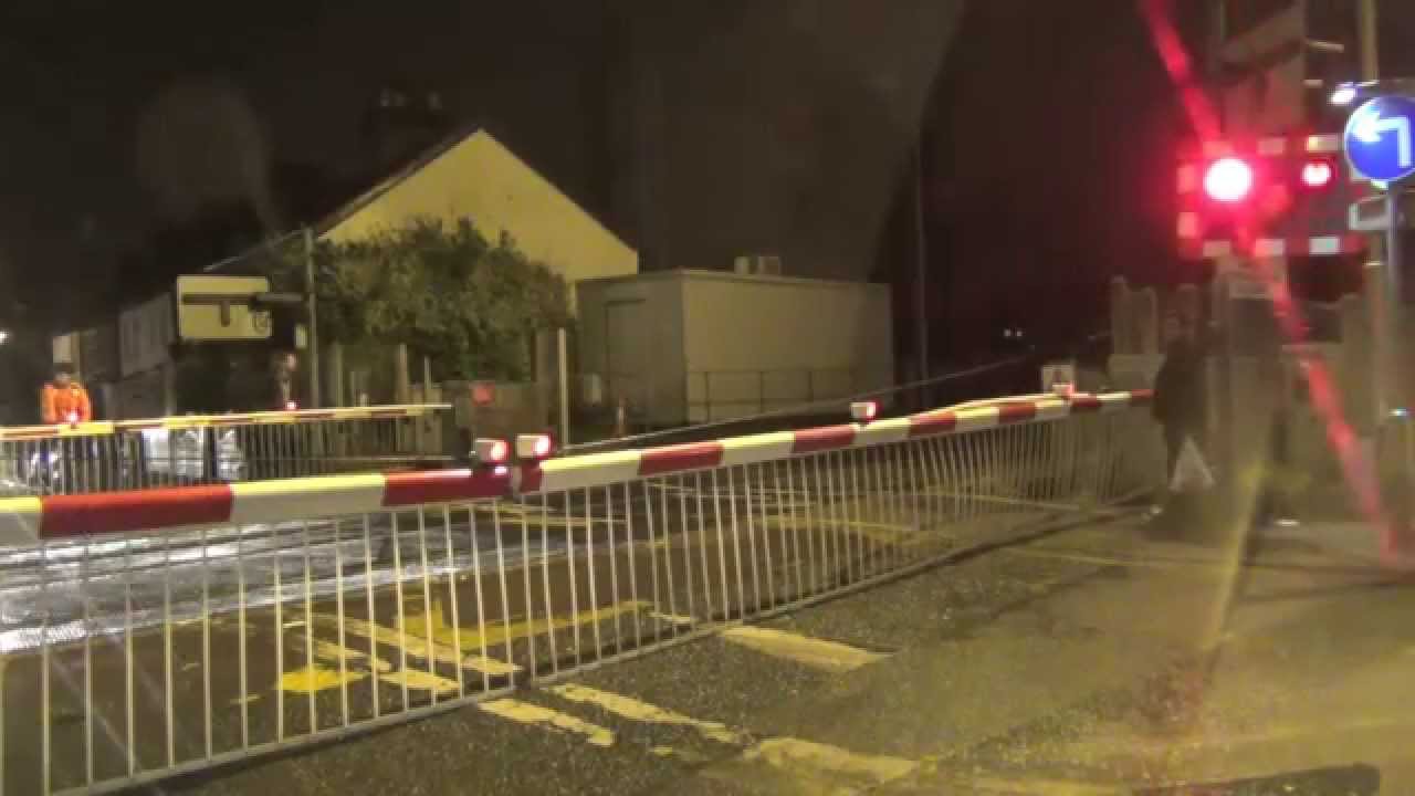 Raynes Park Level Crossing (night)