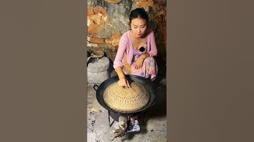 The girl steals cucumbers from the neighbour