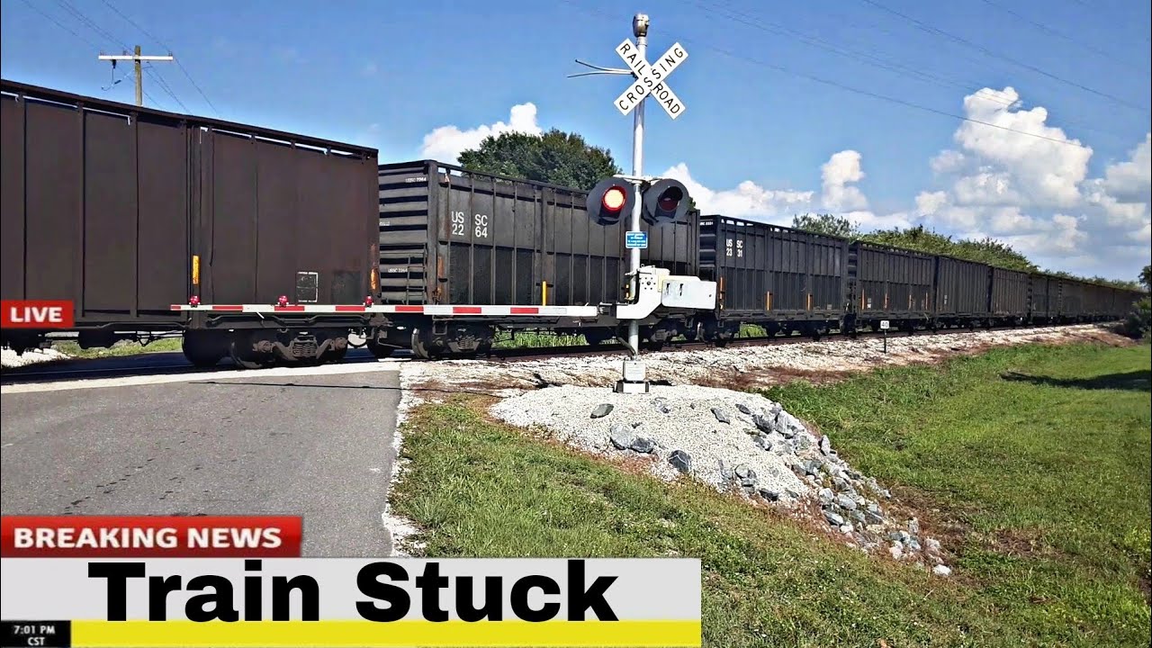 Train Stuck at New Railroad Crossing Due to Bridge Malfunction - YouTube
