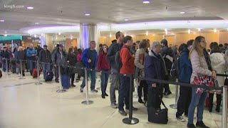 Long lines at Sea-Tac Airport as travelers try to leave before storm