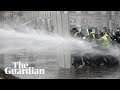 French police fire teargas at 'gilets jaunes' protesters in Paris