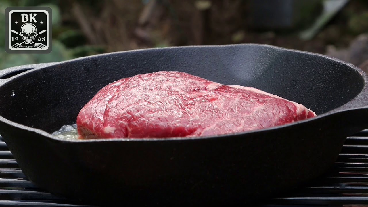 Outdoor cooking on a cast iron skillet - YouTube