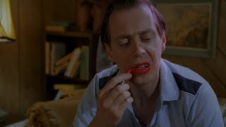Steve Buscemi applying lipstick