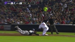 COL@ATL: Pacheco ruled safe after challenge in 7th