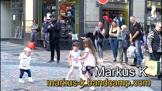 Kids Can’t Resist Busker’s Groove In Inverness - ‘Jumping Jack Flash’ (Stones)