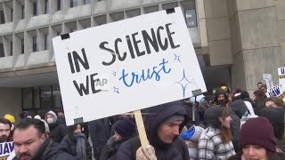 Scientists protest Trump's federal layoffs and funding cuts to health agencies