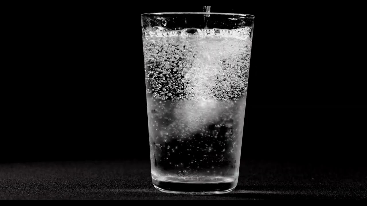 Close up of Soda being Poured into a Glass