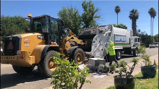 706 329 on Morning Bulk Waste Piles + Green McNeilus XC Rear Loader