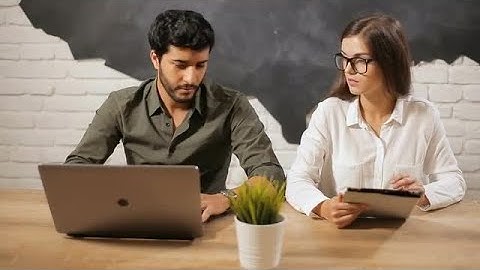 Couple Working On Shared Space Stock Video