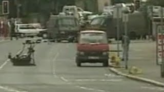 Man walks past an IRA van bomb less than two minutes before it explodes, Lisburn road, June 1993