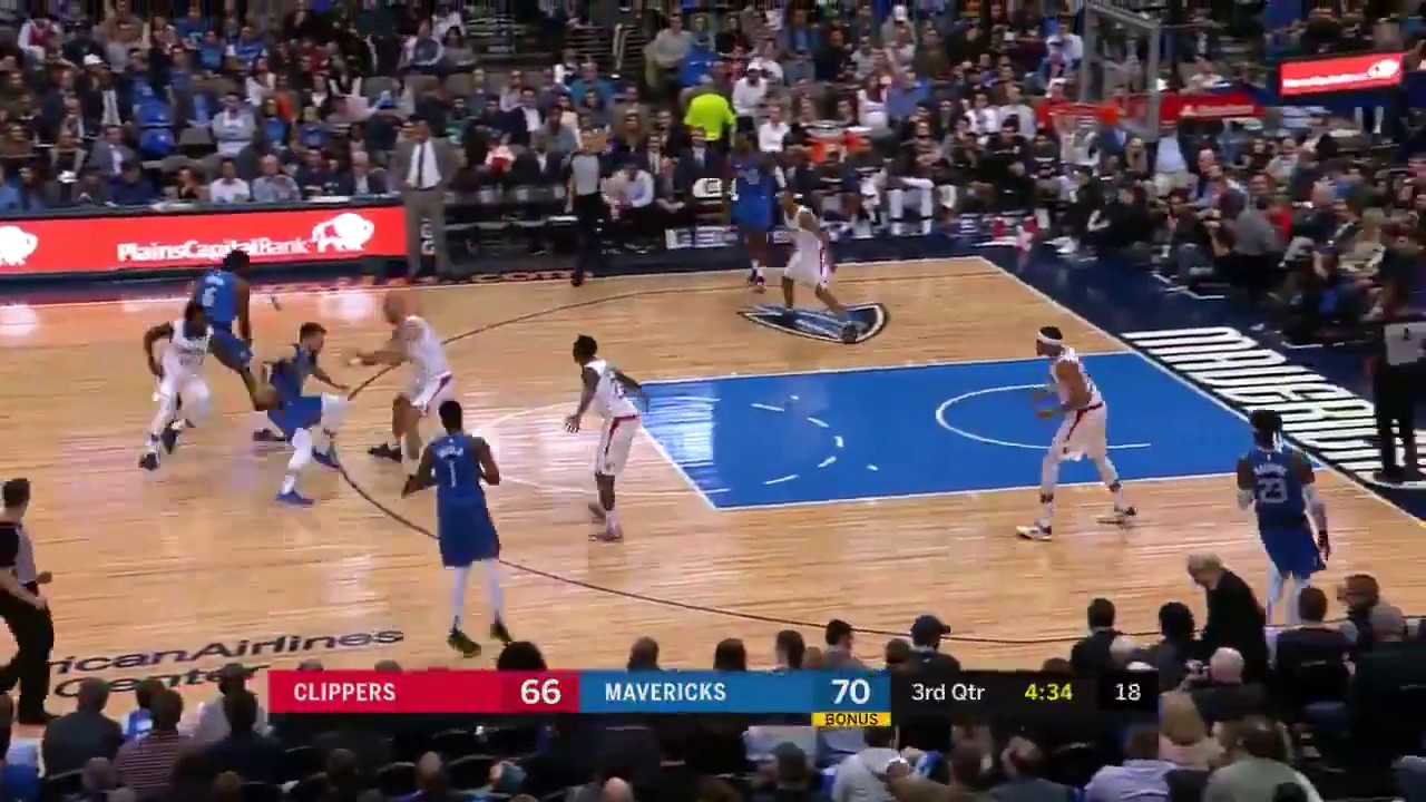 Luka Doncic behind the back to SPLIT his defenders for the layup. - YouTube