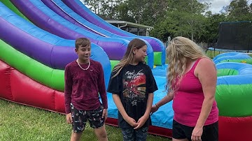 What an EPIC customer! Double Lane Double Trouble Water Slide. See what happens next!!