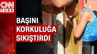 Demir kapıya kafasını sıkıştıran çocuğu itfaiye ekipleri kurtardı