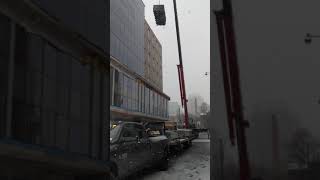 Getting unloaded by a crane downtown Toronto, Ontario - Flatbed Transport by Titanic Trailer Services 37 views 4 years ago 1 minute, 27 seconds