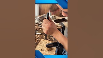 Carving wood carefully with a chisel to create detailed and artistic patterns #woodcarving #popular