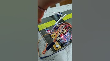 Automatic Railway Gate Controlling System using Arduino UNO and Servo Motors