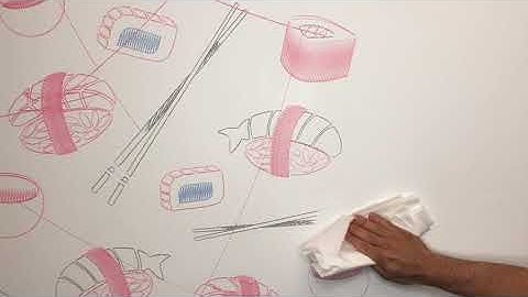 SCRIBIT Installation - manually erasing markers from the wall