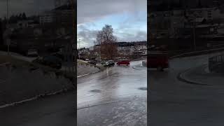 Car Slides Downhill and Narrowly Avoids Collision