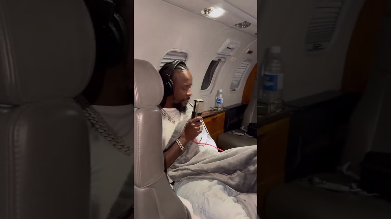 popcaan taking his passion on the plane recording on the plane