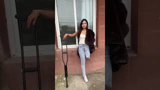 Abby OOE amputee in jeans outside
