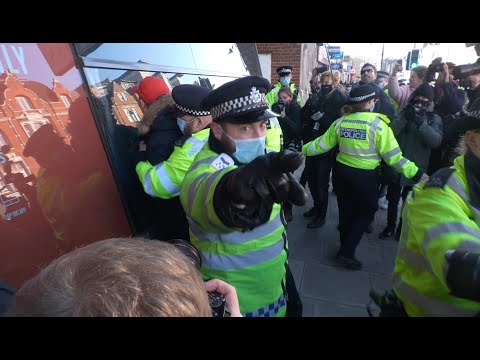 Scuffles and arrests at anti-lockdown protest in Clapham, London.