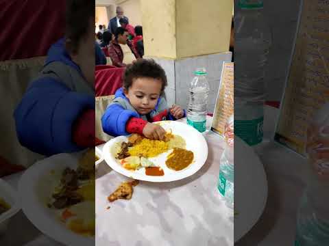 Bhai eating at