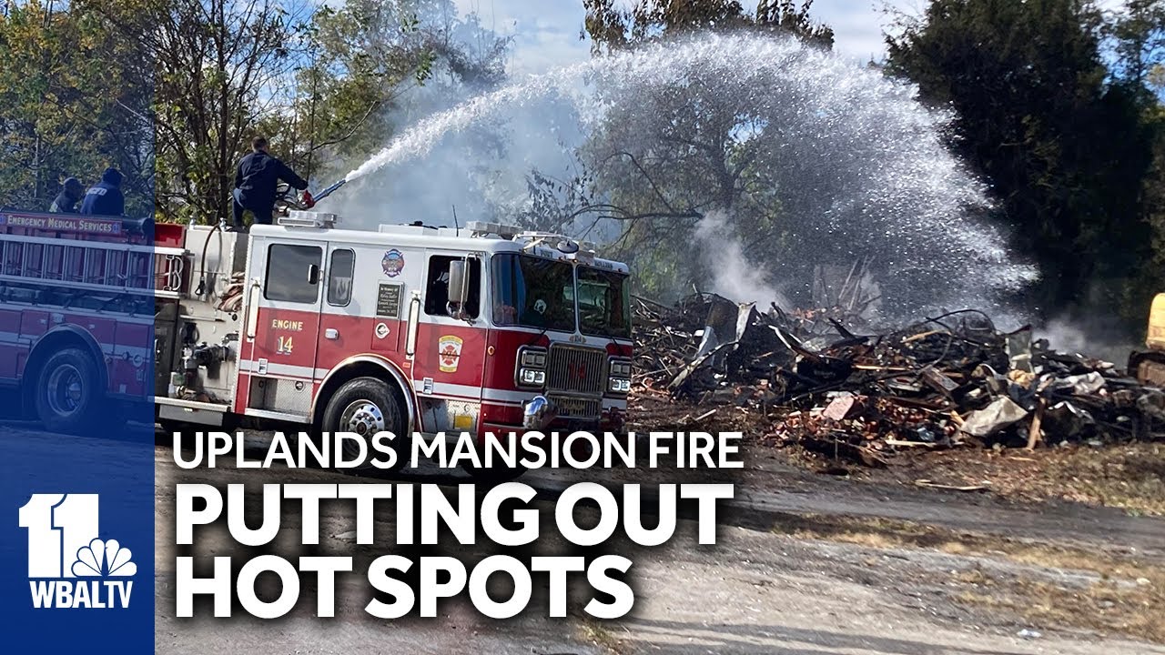 Crews put out hot spots after mansion fire