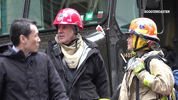 Window Washers Rescued Dangling on the High Rise Building