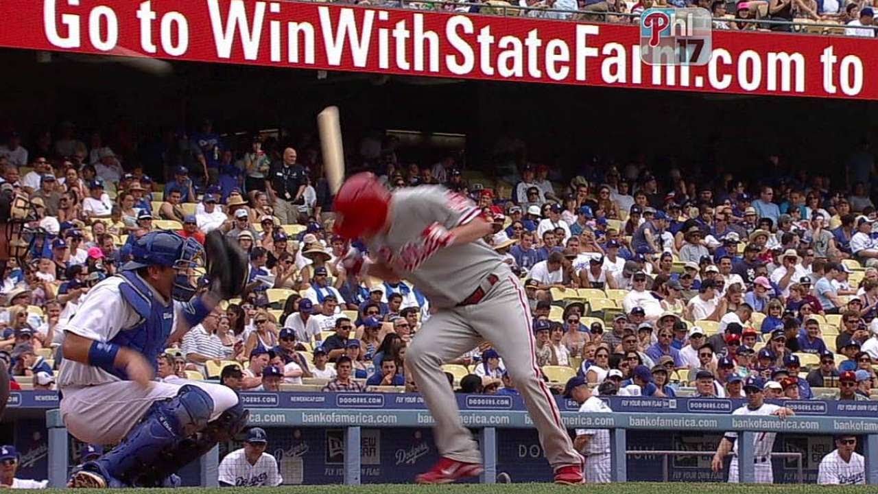PHI@LAD: Kendrick hit in helmet by a Fife pitch