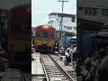 Maeklong railway market Bangkok Thailand one of the most dangerous markets in the world