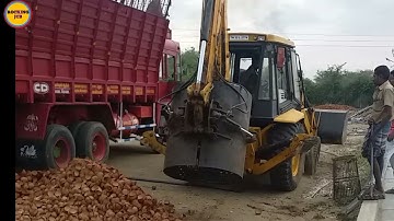 JCB 4DX grapple  Machine  loading   coconut shell