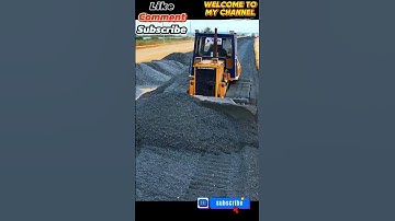 DOZER KOMATSU D53P: Bulldozer At Work Leveling Gravel Stones for New Roads