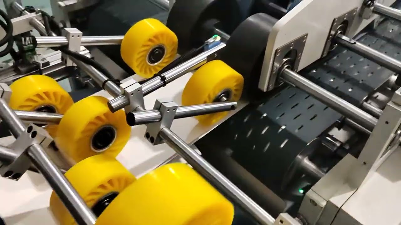 Paper bag tube maker with ribbon insert in 