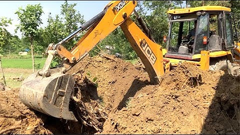JCB Backhoe 3DX Pulling Out The Roots Of A Felled Tree, JCB Vs Soil