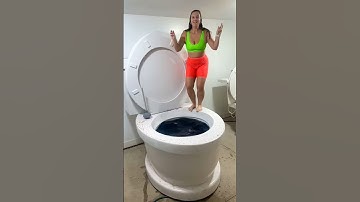 SUPER HIGH JUMP into Worlds Largest Toilet Black Pool in Slow Motion BIG SPLASH#shorts #swimvideo